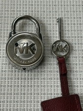MICHAEL KORS SILVER MK LOGO LOCK AND BROWN LEATHER STRAP KEY HANDBAG CHARM