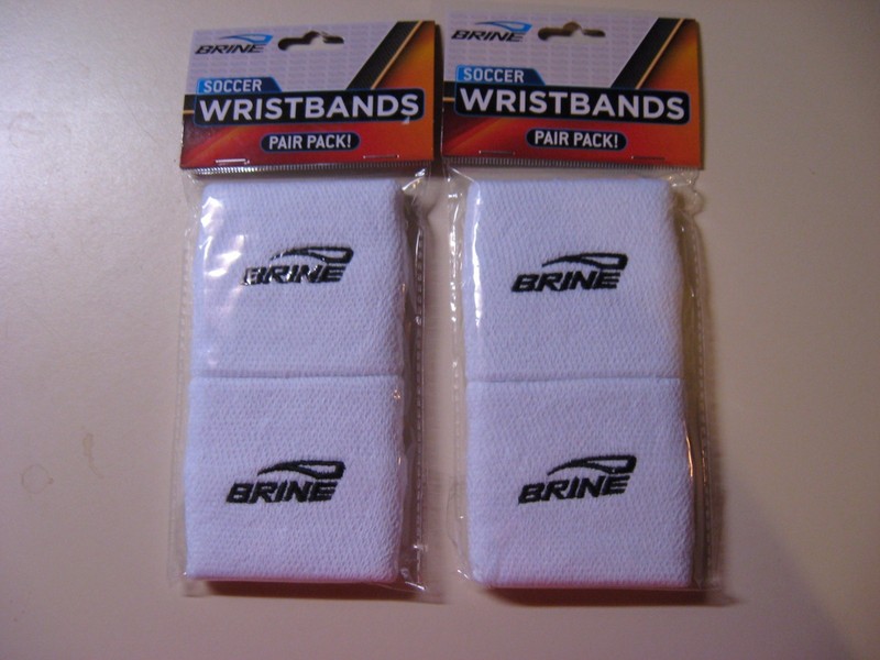4 PACKS OF SOCCER WRISTBANDS - WHITE - NEW AND IN THE ORIGINAL SEALED PACKAGE