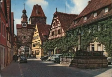 Germany Rothenburg ob der Tauber Rodergasse with St. Marcus Tower Fountain,Rothe