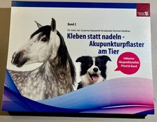 Kleben statt nadeln-Akupunkturpflaster am Tie...