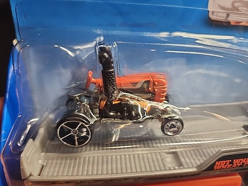 HOT WHEELS 2010 PIANALE FARM HAULER con trattore incluso nel set arancione nuovo con scatola - Foto 3 di 12