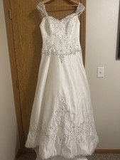 Beautiful Wedding Dress and Veil. Used And In Very Good Condition.