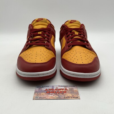 burgundy and yellow nike