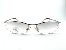 VINTAGE CALVIN KLEIN SUNGLASSES STEEL HALFRIM FRAME WHITE LENS Y2K NR 2034 145
