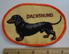 Vintage DACHSHUND Dog Show Breed Embroidered Orange Border Patch New Old Stock