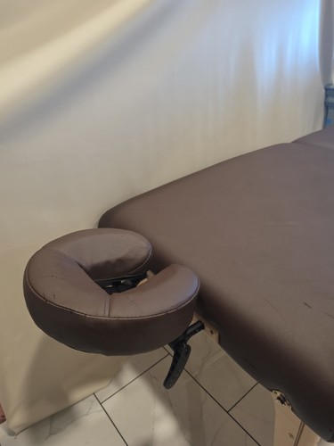 Folding massage table