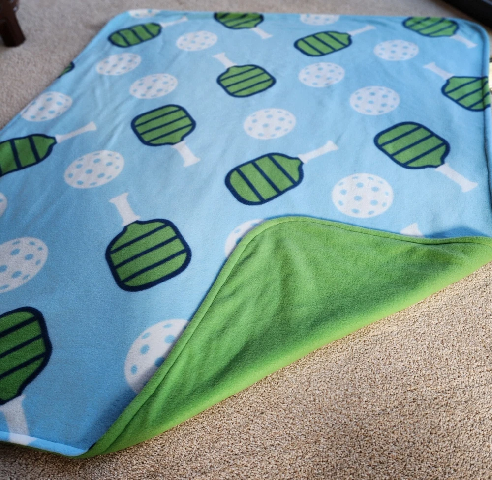 Pickleball Print Fleece Throw Blanket 48" x 60" Blue Reversible to Solid Green