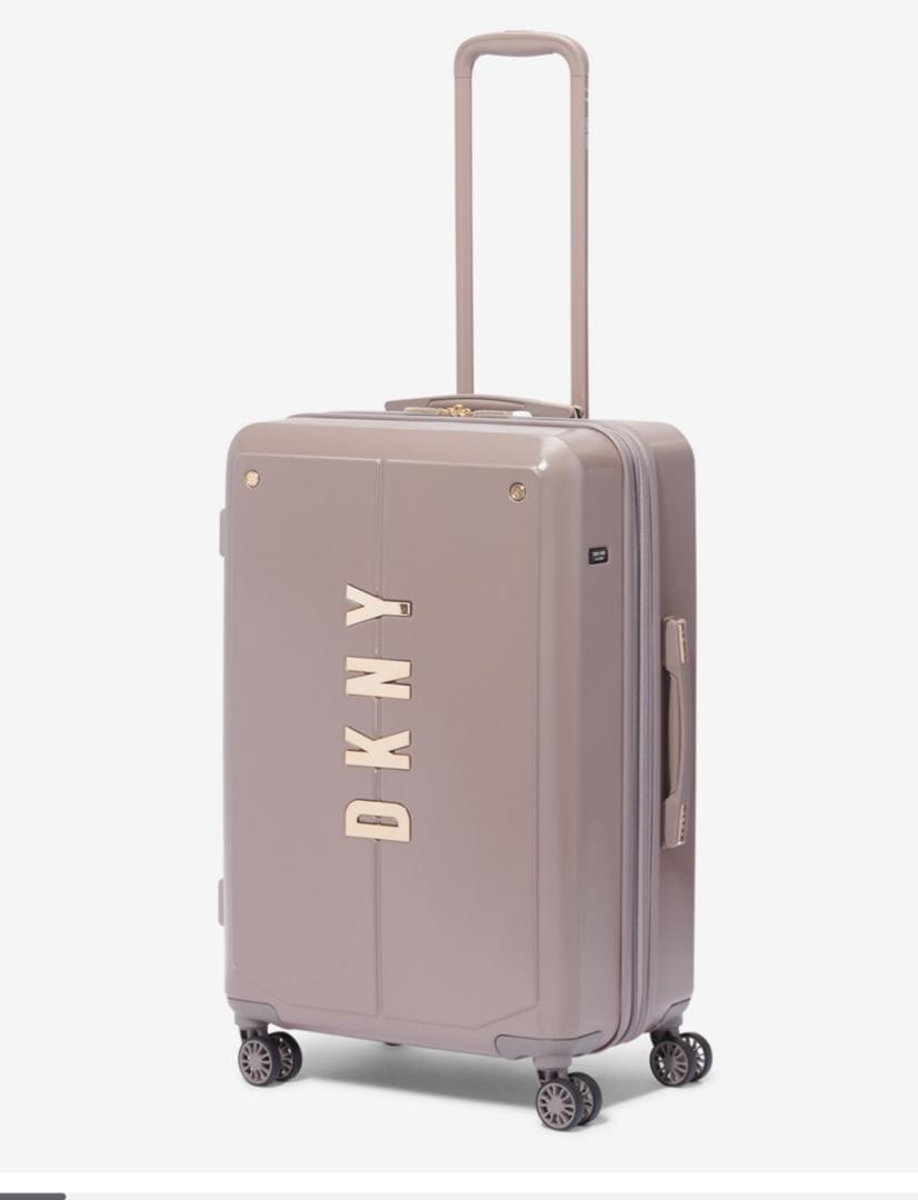 DKNY CLOSEOUT NYC - Pequeño (cabina) - 8 ruedas giratorias con acabado dorado