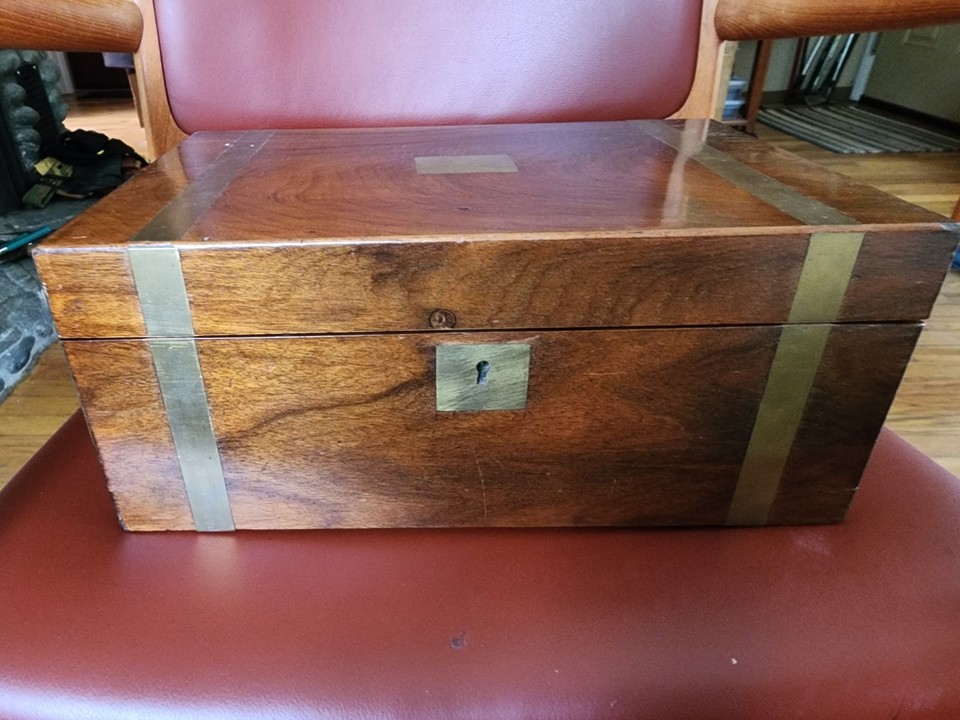 Brass-bound mahogany antique writing slope with original key — a portable Victorian writing desk that's also a stunning display object.