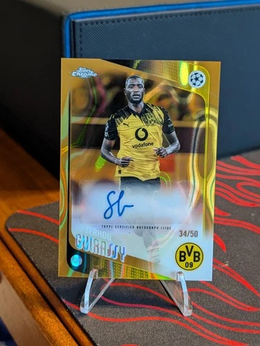 SERHOU GUIRASSY 2025-26 TOPPS CHROME UEFA CLUB GOLD LAVA AUTO/50 #CA-GU