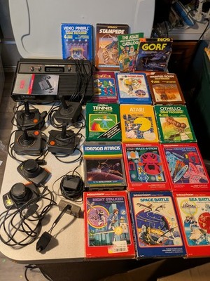 Vintage Atari 2600 Bundle: Console, Cords, Complete Games, Joysticks, Paddles