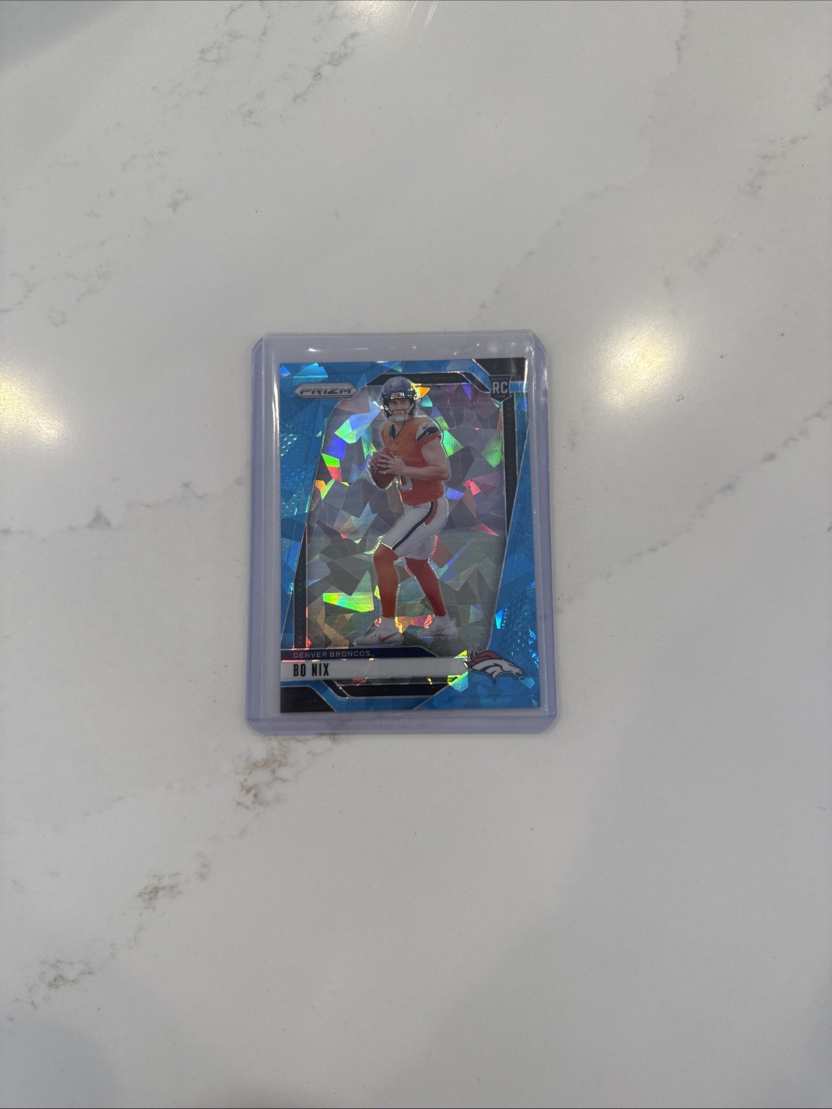 2024 Panini Prizm - Rookies Bo Nix #309 Blue Ice Prizm 56/ 99 (RC)