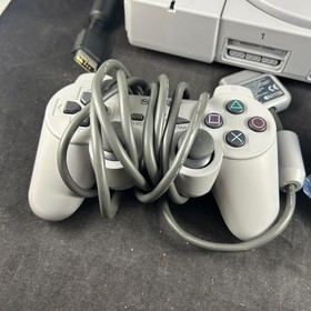 SONY PLAYSTATION 1 PS1 GAMING SYSTEM CONSOLE W/ CONTROLLER WIRES & MANUAL TESTED