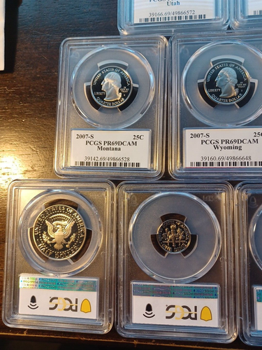 2007s set of pcgs pr69 dcam 1c,5c,10c, 5 state 25c, 50c,$1 coins w/ case - Picture 15 of 24
