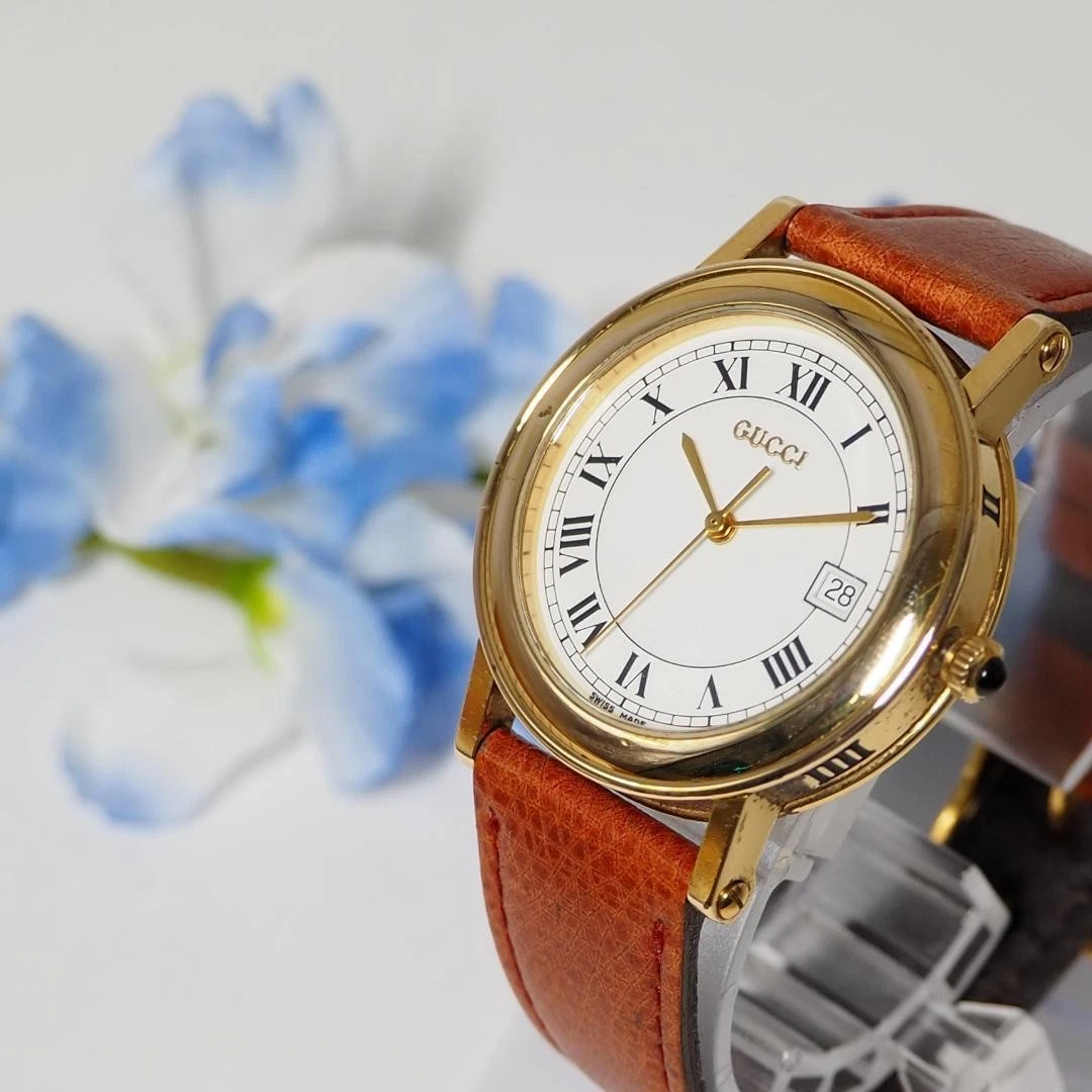 Montre homme Gucci Roman Date ceinture cuir C830