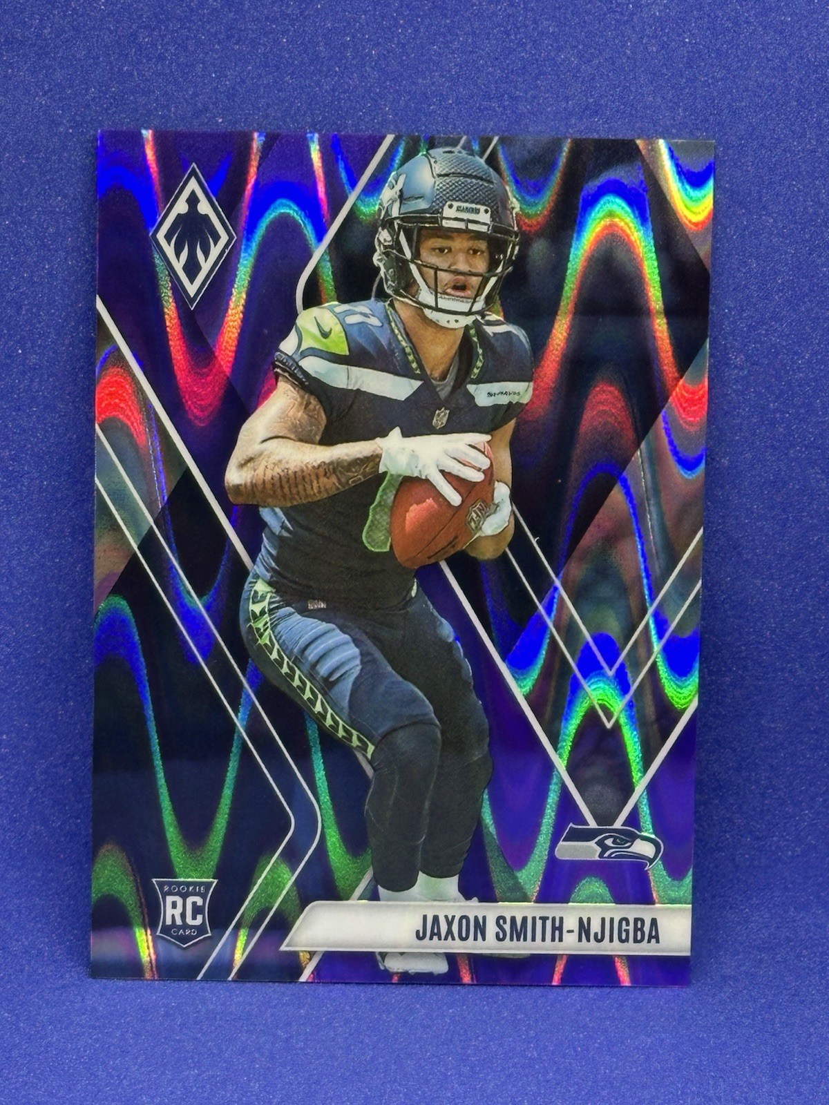 2023 Panini Phoenix - Rookies Jaxon Smith-Njigba #106 Purple Seismic /125 (RC)