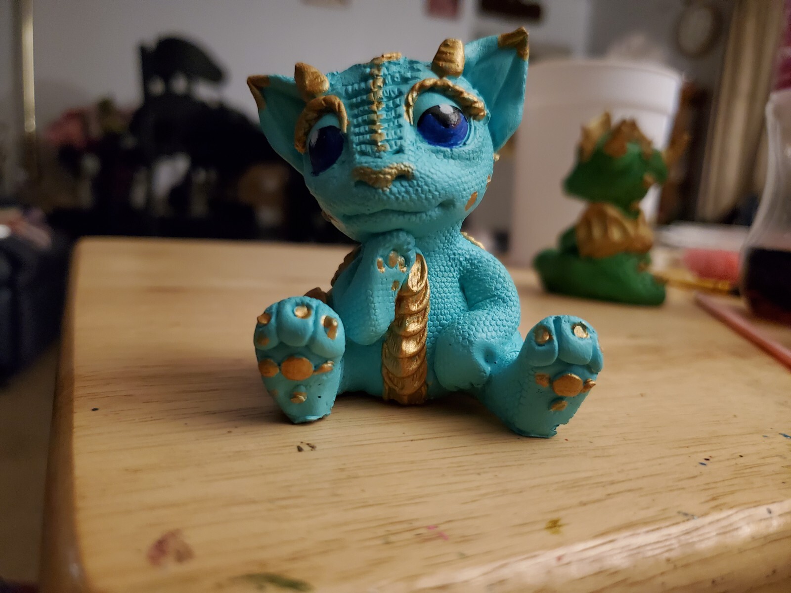 Teal and Gold Metallic Dragon Statue with Intricate Cast Details-image