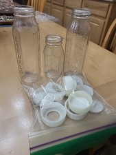 Lot Of Evenflow Plastic Baby Bottles And Lids