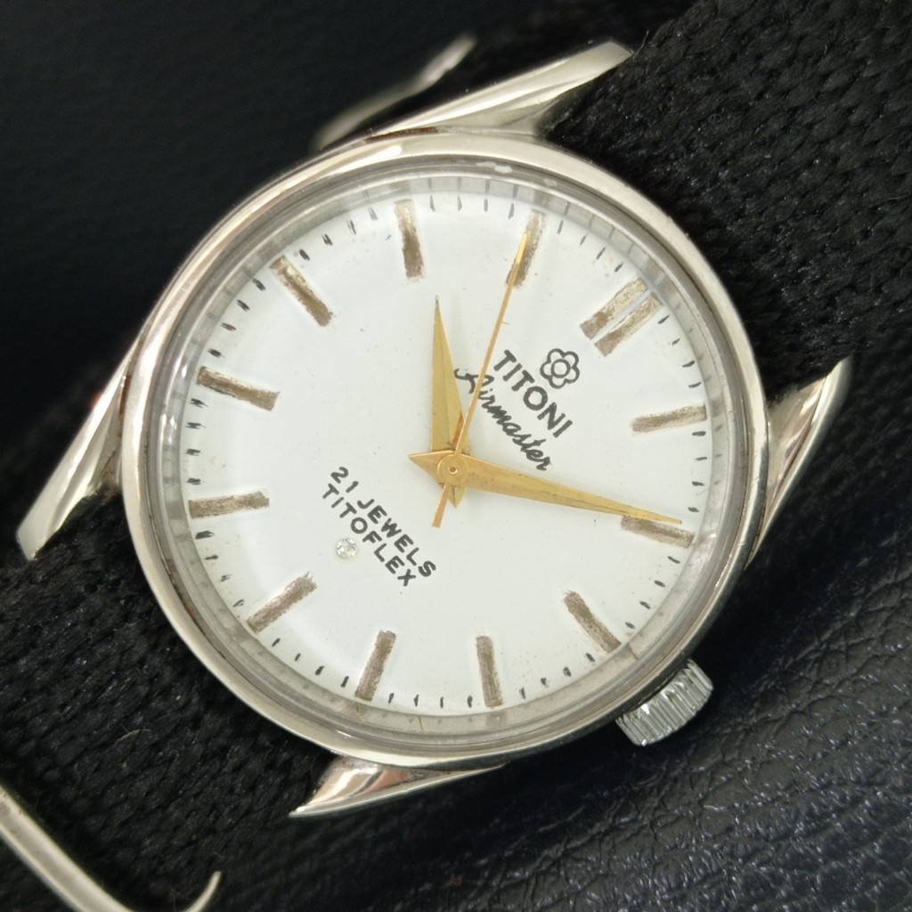 VINTAGE WHITE AIRMASTER TITOFLEX MENS HAND-WINDING WATCH SWISS a705105-1 TITONI - vintagewatches.pk