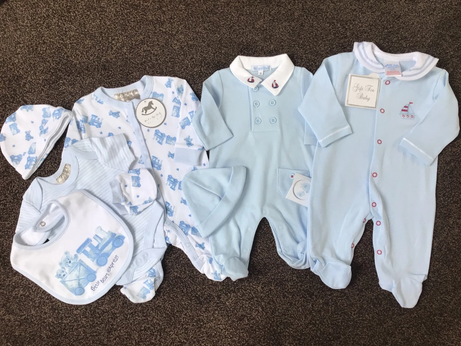 Bundle of newborn baby boys clothes train baby grow outfit newborn , 0-3 months
Opens in a new windo