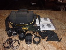 NIKON D40X DIGITAL CAMERA 3145164, 2 LENS NIKON QUICK CHARGER MH-23 BOOKS  BAG