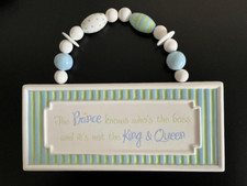 CERAMIC HANGING PLAQUE FOR BABY-- " PRINCE IS THE BOSS " FROM GRASSLANDS ROAD