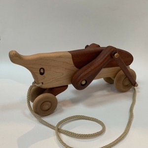 wooden grasshopper pull toy