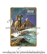 metal wall  1977  Wyoming hunting fishing  Bighorn Sheep metal tin sign