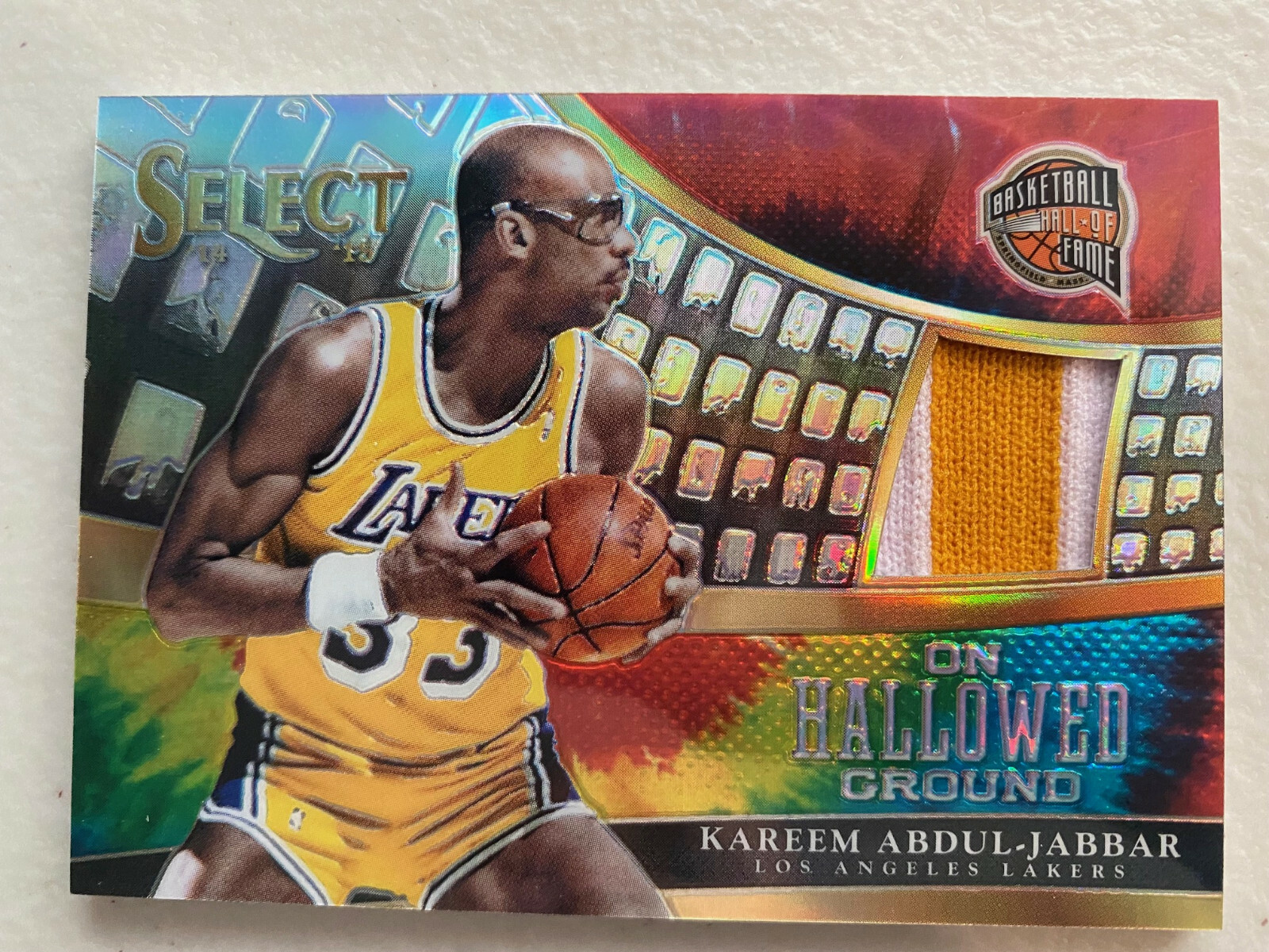 Kareem Abdul Jabbar Lakers jersey patch card 22/25 Panini Select 