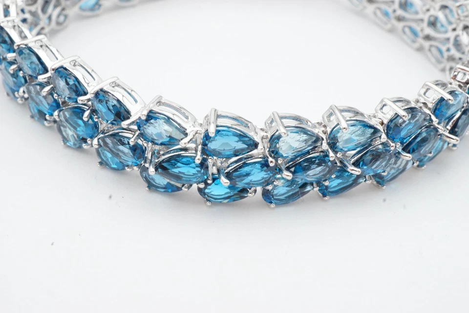 Brazalete de tenis de espinela azul de plata de ley 925 de 40 quilates creado en laboratorio de 7,5" Foto 3 de 4