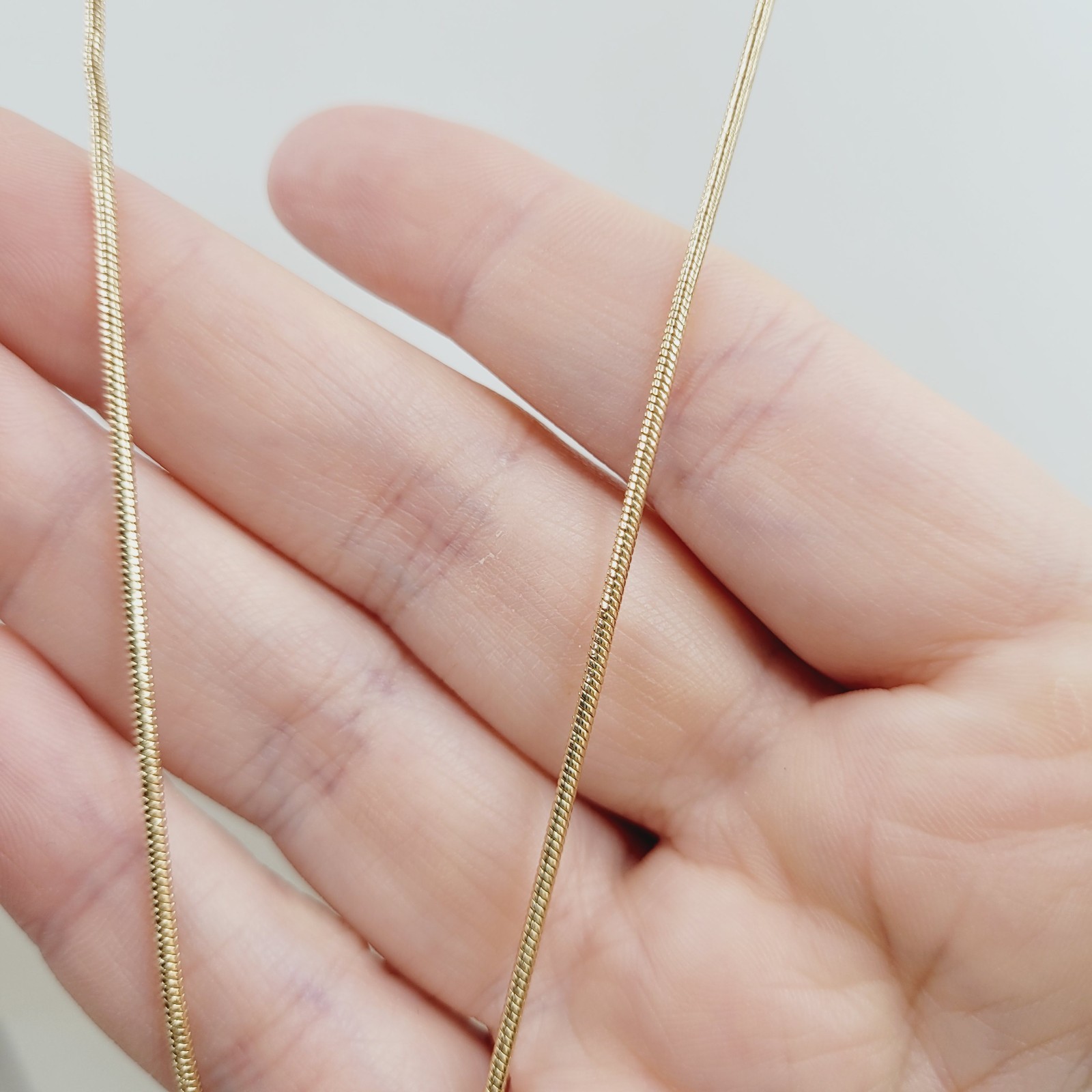 Gold Tone Snake Chain Interlocking Ring Pendant T… - image 4