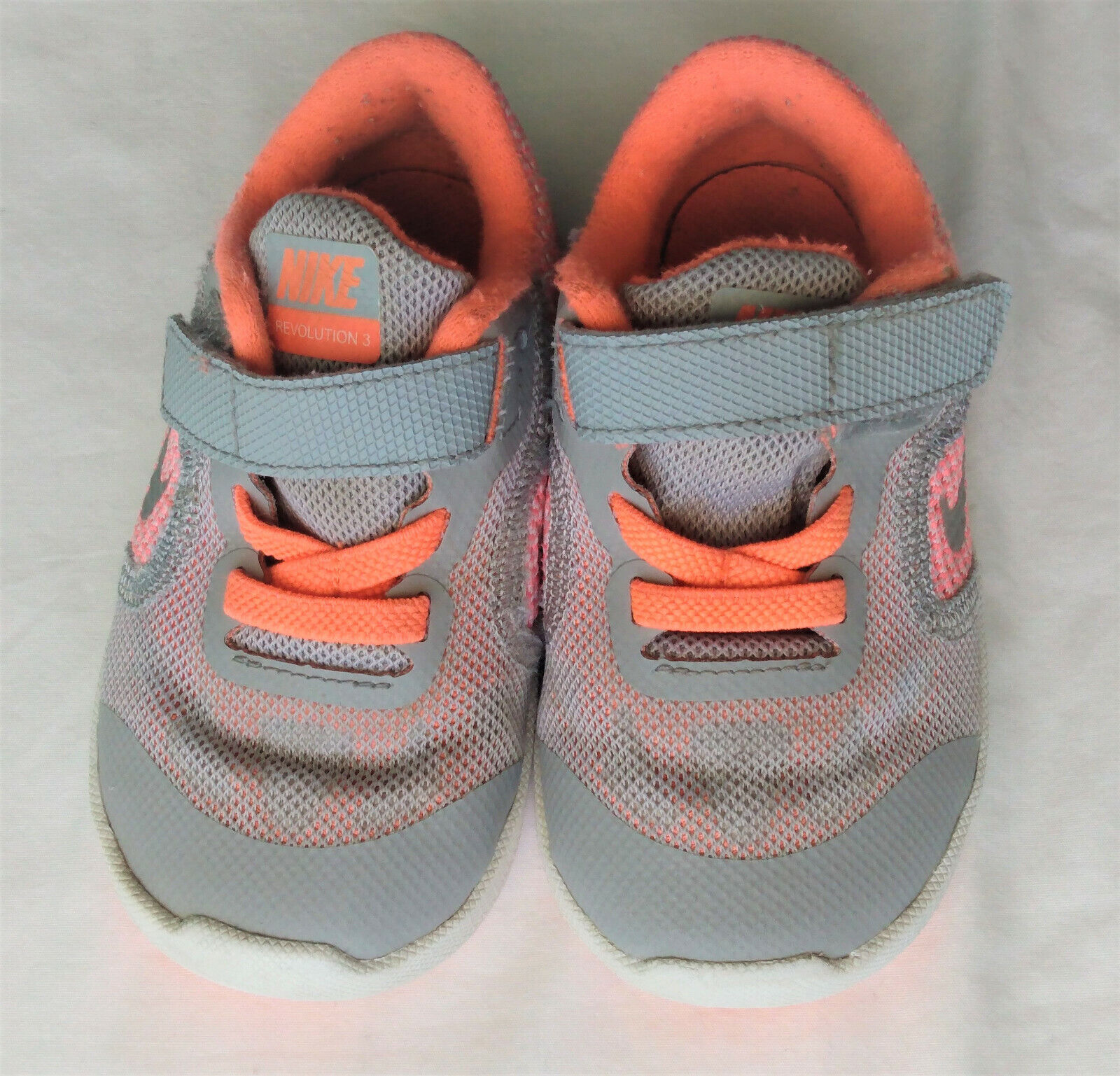 NIKE Revolution Girl Size 6 Small Gray Coral Pink Sneakers
