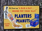 VINTAGE PLANTERS PEANUTS PORCELAIN SIGN 'A BAG A DAY BRINGS PEP YOUR WAY' 12"x8"