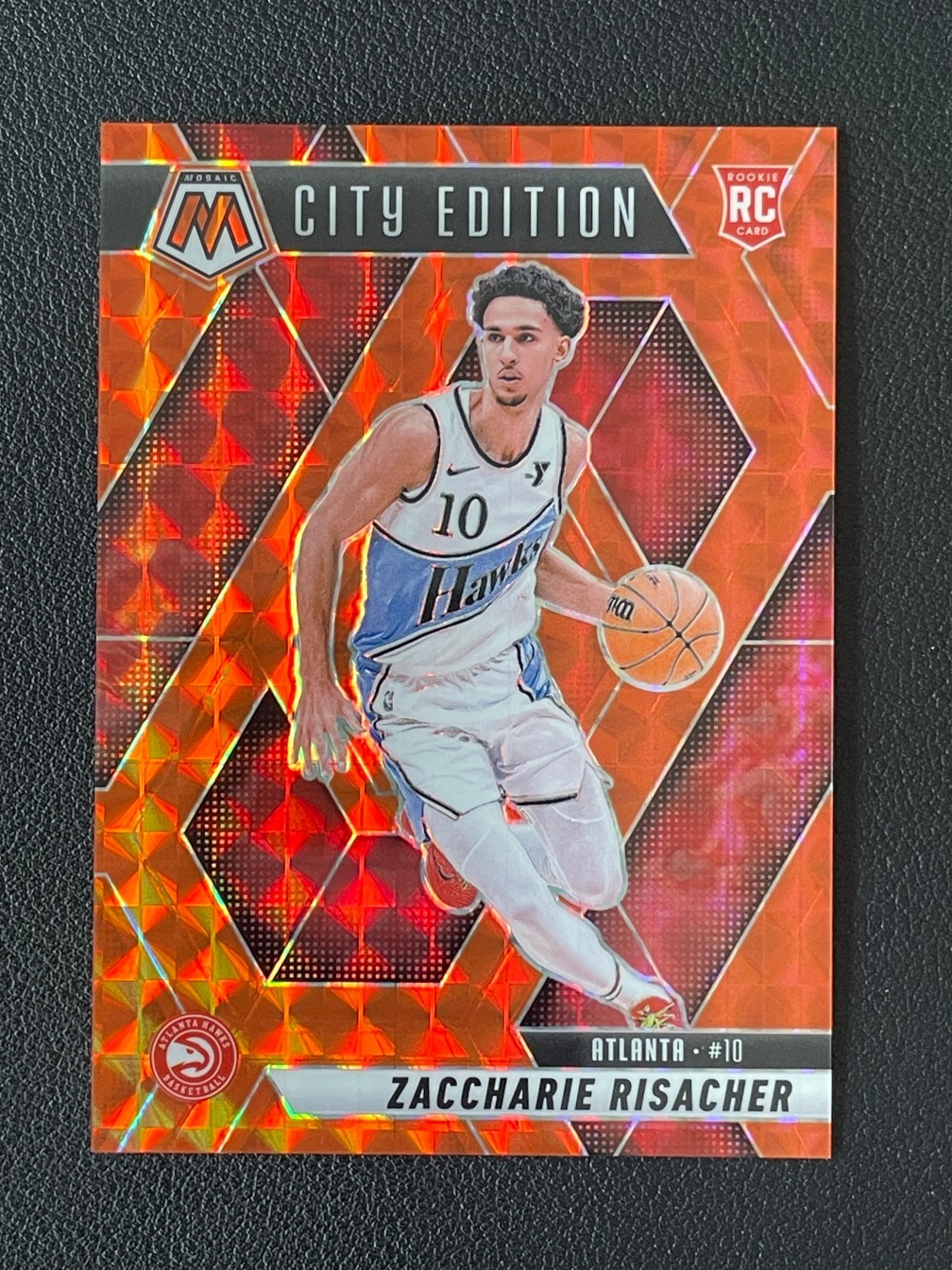 Zaccharie Risacher 2024-25 Panini Mosaic City Edition Orange Prizm 028/249 RC