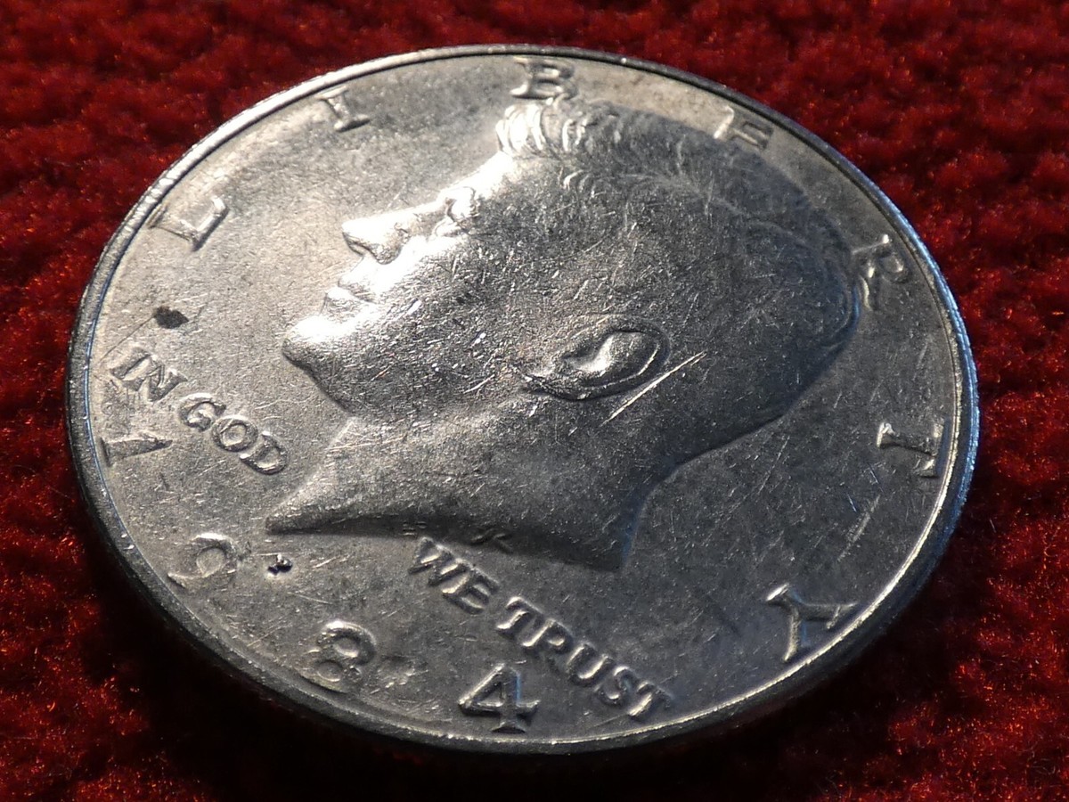 Mint Error 1984-P Kennedy Half Dollar Coin with Strike Thru