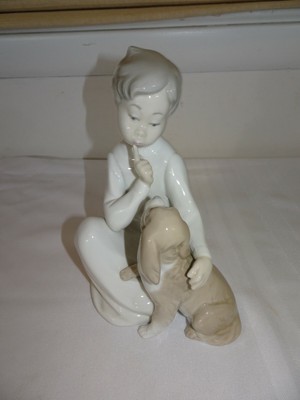lladro boy sitting with dog