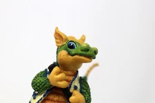 1997 Spangler’s Realm 191014 Hole in One 4" figurine