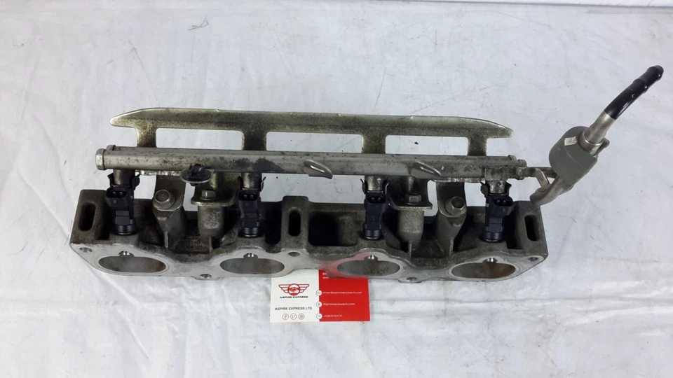 Adaptador de colector de admisión de riel inyector Nissan Rogue 2008-2013 OEM 2,5 L Foto 2 de 3