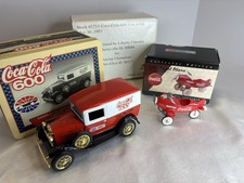 pair of coca cola collectibles . Coca-Cola 600 van w/tin and coke pedal plane