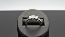 1.00 TCW, 14 Kt. Three Stone Princess Cut Diamond Engagement Ring.