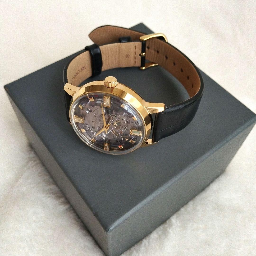 Timex M108 Unveil Automatic Skeleton 38mm Gold Case Black Leather 