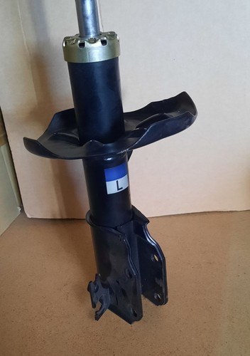 MAZDA 323 BJ 1998 - 2000 FRONT SUSPENSION SHOCK STRUT DAMPER LEFT LH GENUINE - Picture 2 of 4
