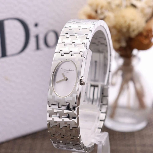 Montre femme Miss Dior D70 100 à piles, bon état, bracelet métal