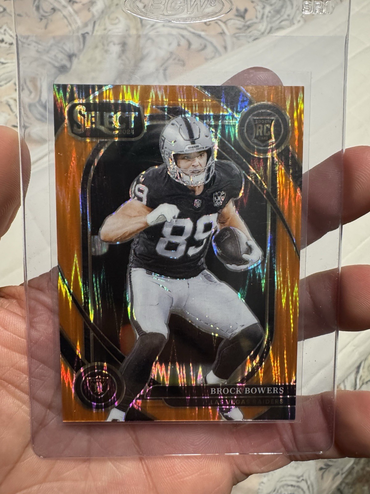 2024 Panini Select - Club Level Brock Bowers #222 Orange Shock Prizm /399 (RC)