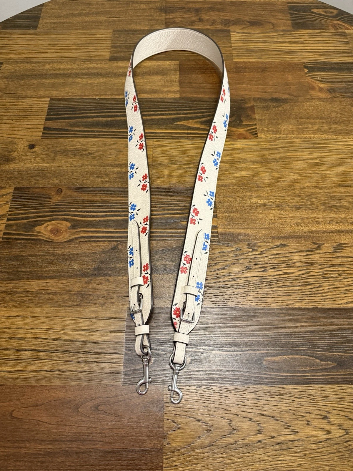 Borsa a tracolla Coach Strap pelle ciottoli stampa floreale gesso argento CU241