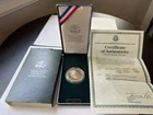 Photo of a 1990-P Eisenhower Commemorative Dollar from an eBay listing that sold on Jul 18, 2026