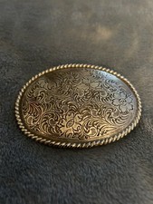 OVAL SCROLL SILVER BELT BUCKLE WITH ROPE EDGING 2 10/16 X 3 1/2 FLORAL DESIGN