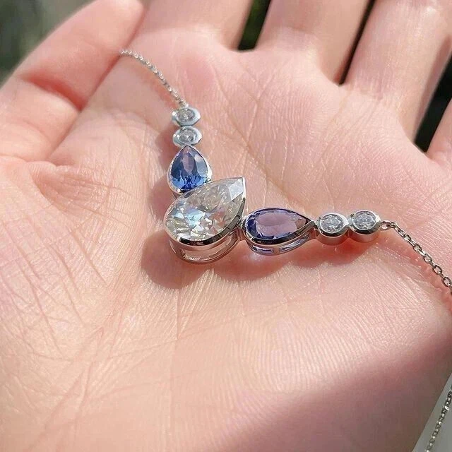 Colgante de boda de zafiro pera para mujer 2 quilates con diamantes creados en laboratorio enchapados en oro de 14 quilates Foto 2 de 4