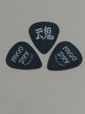 Out of print Motley Crue Nikki Sixx guitar pick