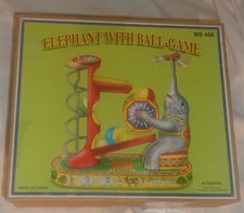 SCHYLLING ELEPHANT WITH BALL GAME TIN TOY LOOKS NICE NEEDS REPAIR